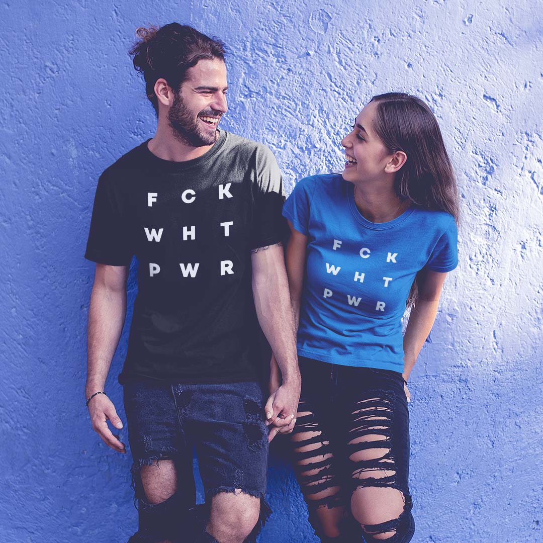 A couple laughing, each wearing a t-shirt that reads F C K W H T P W R